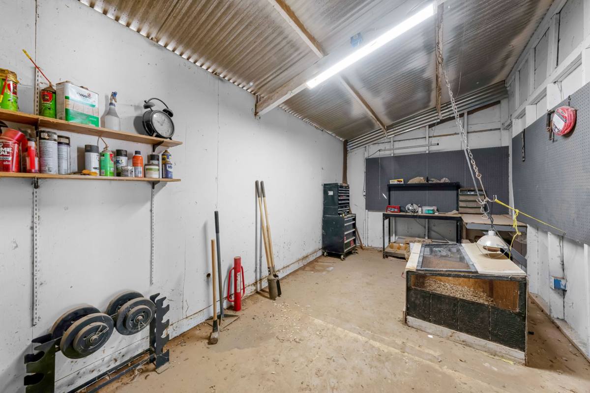 Workshop with workbench and pegboard