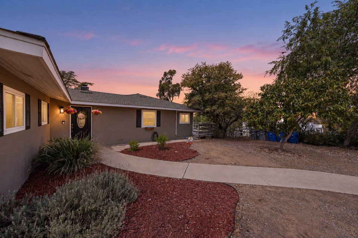 Front entry and landscaped walkway at dusk