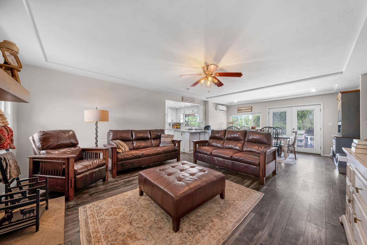 Open living room flowing into the dining area and kitchen